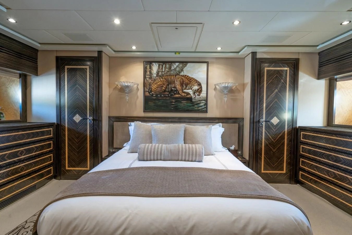 a large bedroom with a large bed aboard ENCORE Yacht for Sale