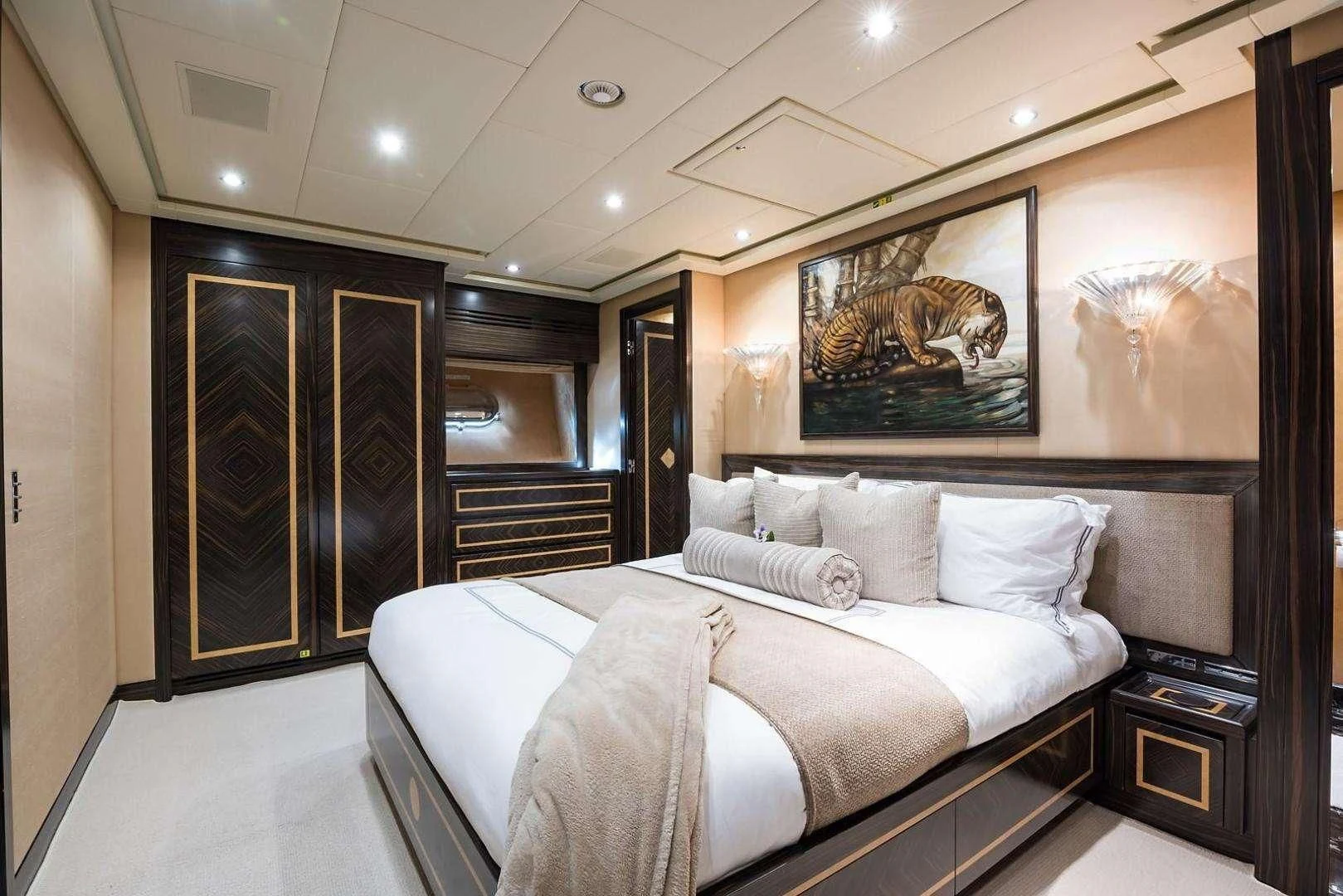 a bed in a room aboard ENCORE Yacht for Sale