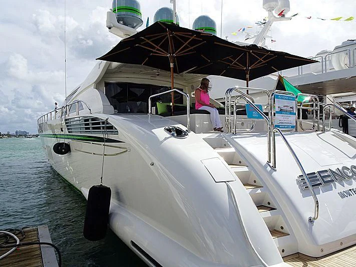 a couple of people on a boat aboard ENCORE Yacht for Sale