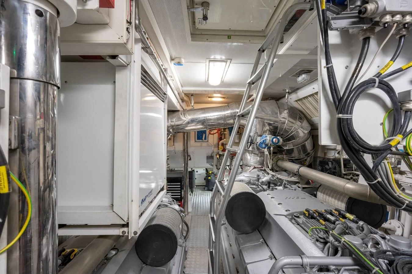 a large factory with several machines aboard ENCORE Yacht for Sale