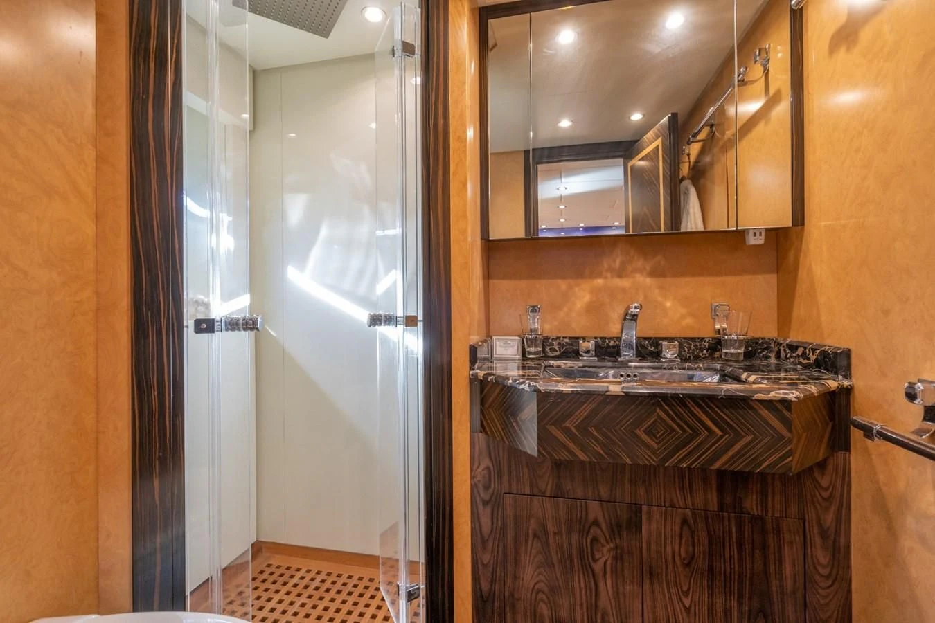 a bathroom with a sink and a mirror aboard ENCORE Yacht for Sale