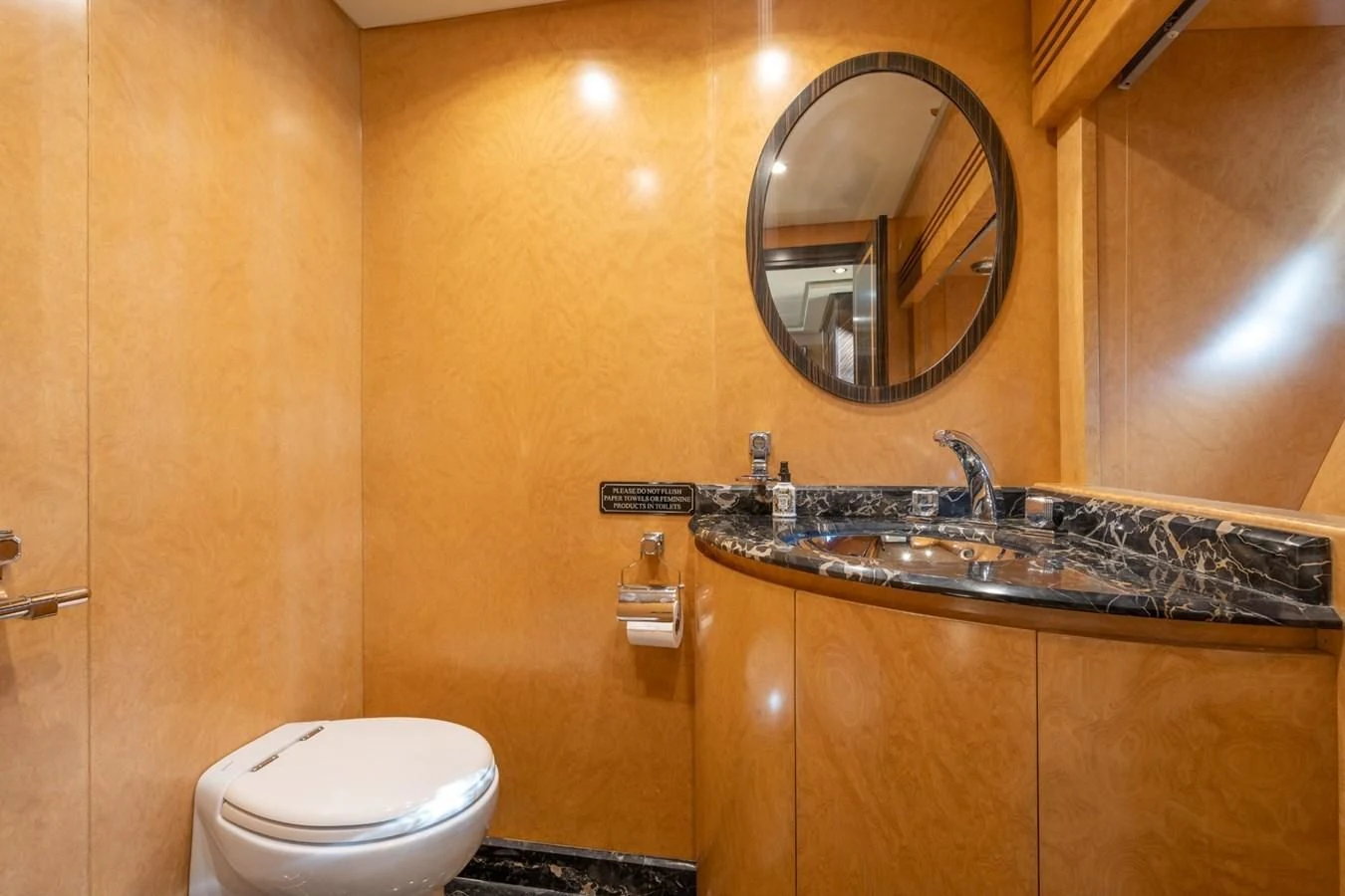 a bathroom with a sink and a toilet aboard ENCORE Yacht for Sale