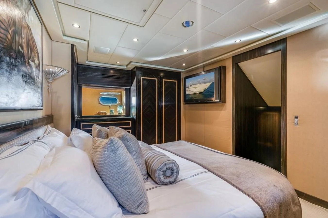 a bed in a room aboard ENCORE Yacht for Sale