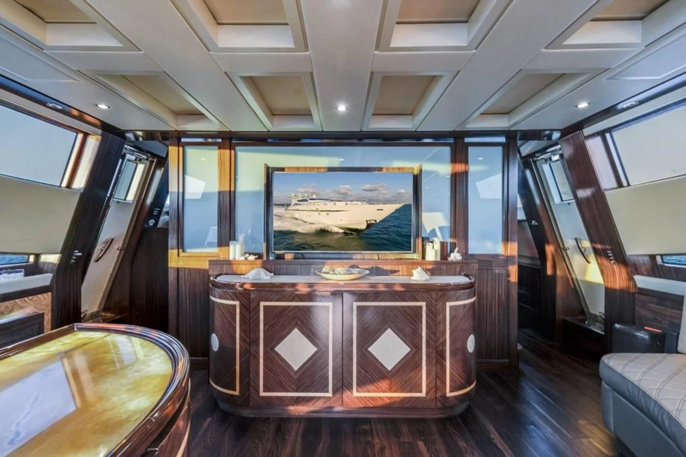 a room with a large painting on the wall aboard ENCORE Yacht for Sale