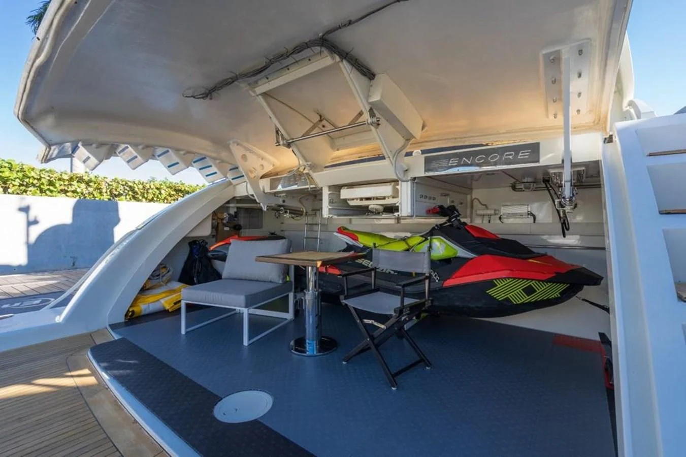 a tent with tables and chairs aboard ENCORE Yacht for Sale