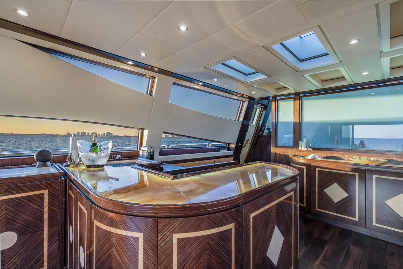 a kitchen with a large island aboard ENCORE Yacht for Sale