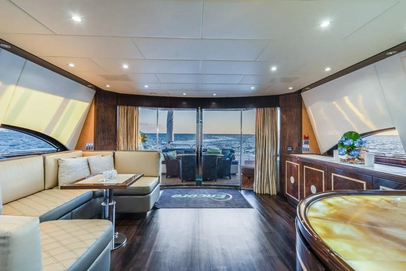 a living room with a large window aboard ENCORE Yacht for Sale