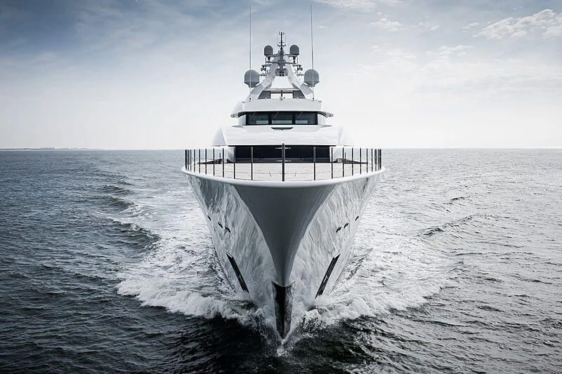 a large white ship in the water aboard BLISS Yacht for Sale