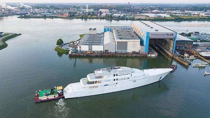 a large ship in the water aboard BLISS Yacht for Sale