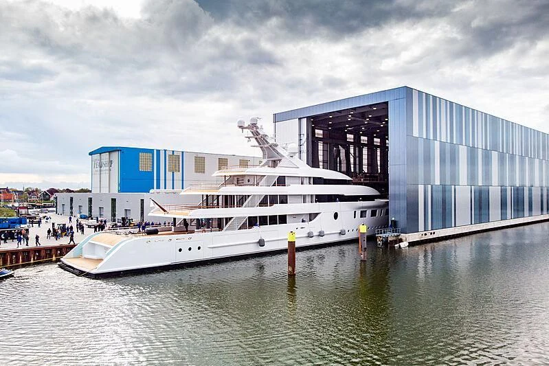 a large cruise ship docked aboard BLISS Yacht for Sale