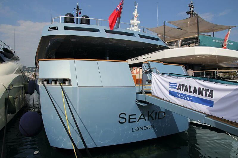 a couple of boats are parked in a harbor aboard QUEEN BLUE Yacht for Sale