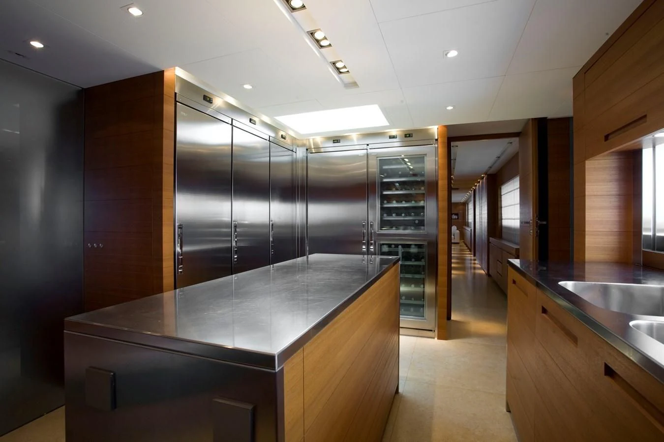 a large kitchen with glass doors aboard QUEEN BLUE Yacht for Sale