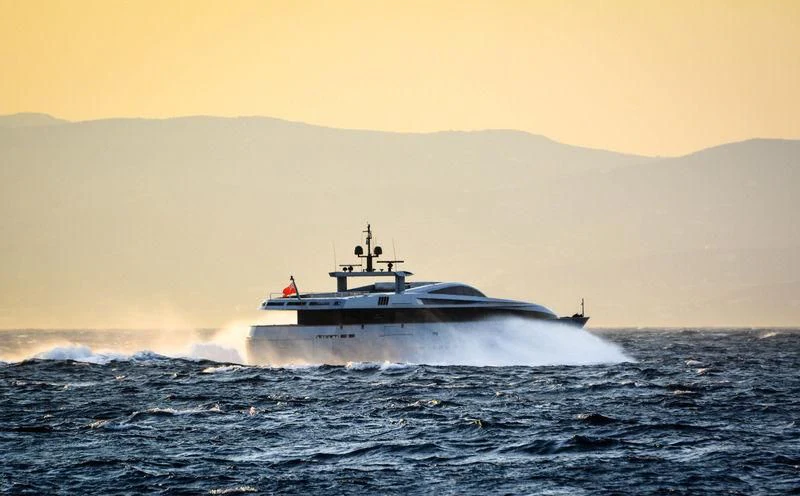 a large ship in the water aboard QUEEN BLUE Yacht for Sale