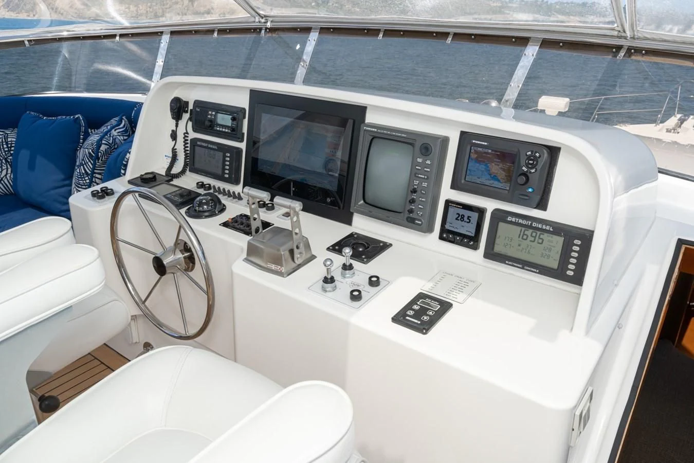 a white car with a screen and buttons and a fan aboard MAHANA Yacht for Sale