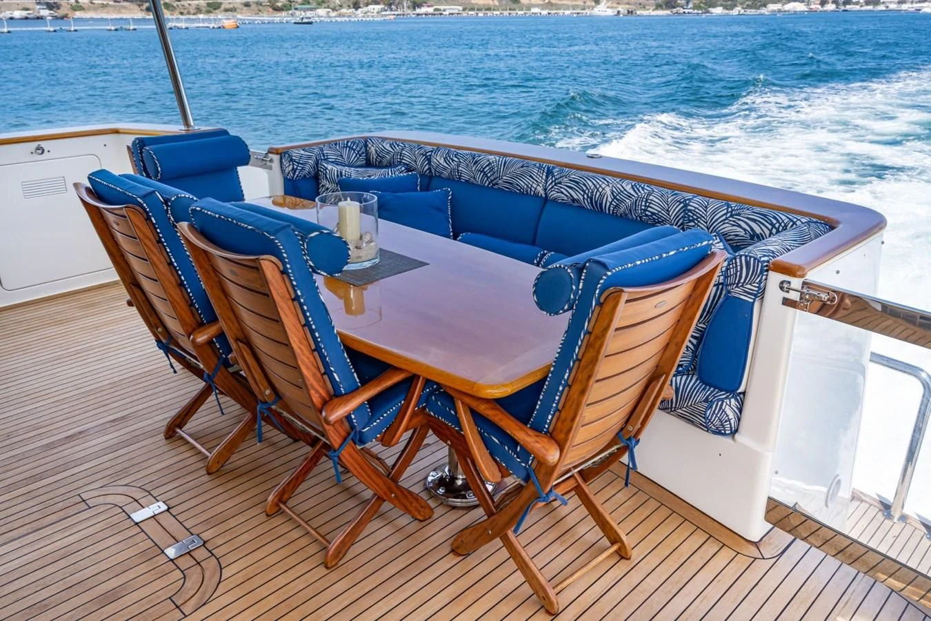 a table and chairs on a boat aboard MAHANA Yacht for Sale