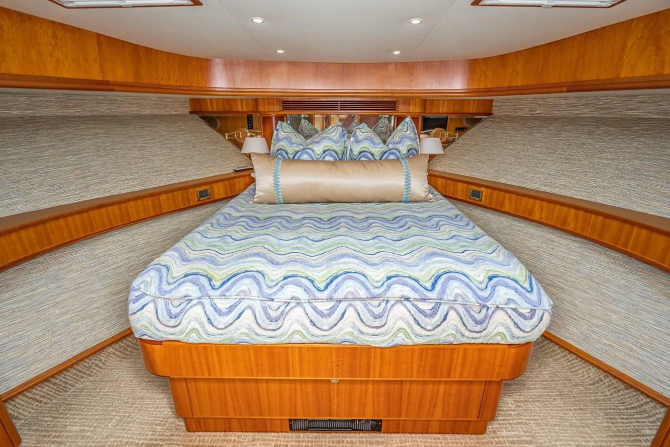a couple of beds in a room aboard MAHANA Yacht for Sale
