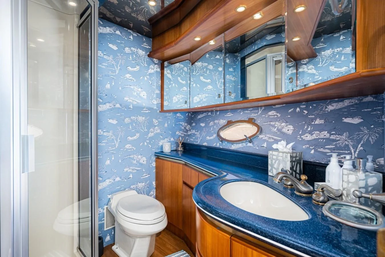 a bathroom with a sink and a toilet aboard MAHANA Yacht for Sale
