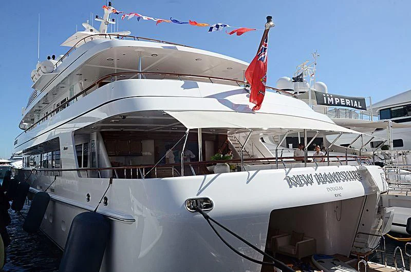 a boat with flags on it aboard PREDICTION Yacht for Sale