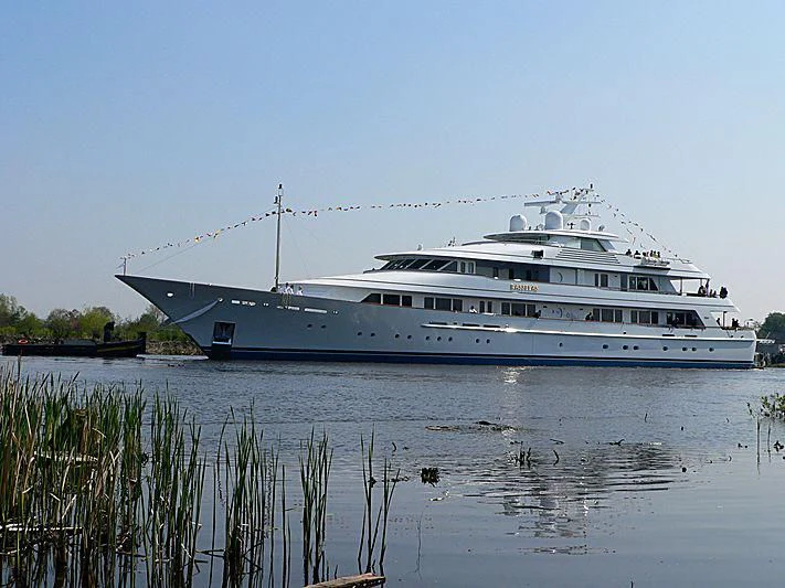 a large white yacht in the water aboard PREDICTION Yacht for Sale
