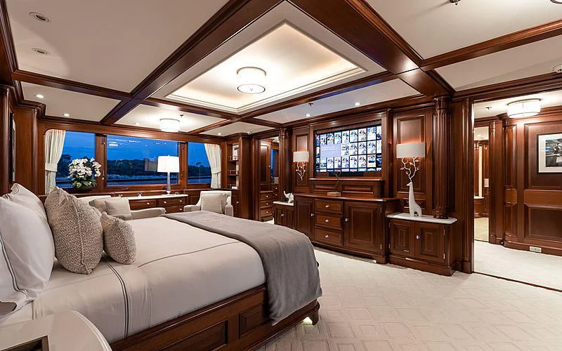 a large bed in a room aboard PREDICTION Yacht for Sale