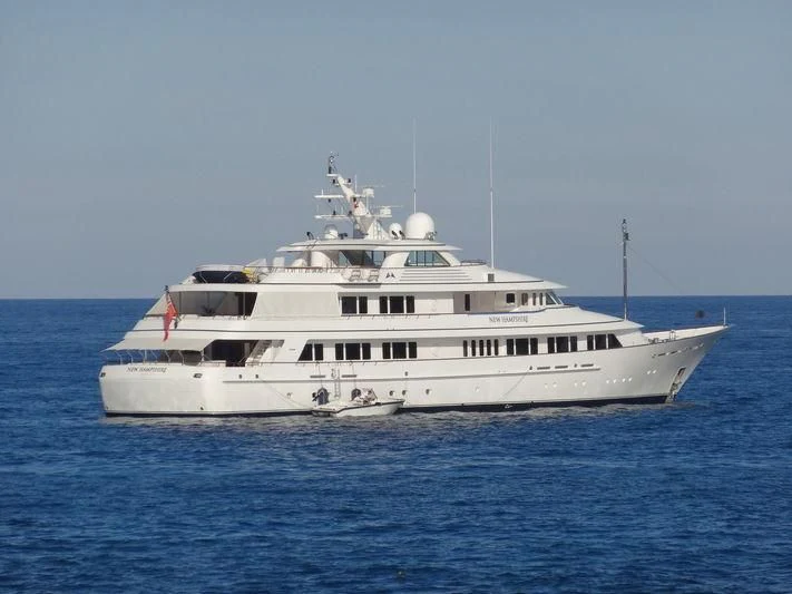 a white boat in the water aboard PREDICTION Yacht for Sale