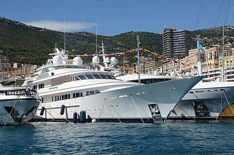 a large white boat in the water aboard PREDICTION Yacht for Sale