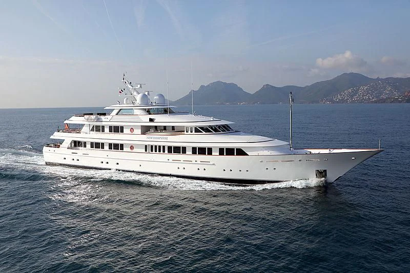 a white boat in the water aboard PREDICTION Yacht for Sale