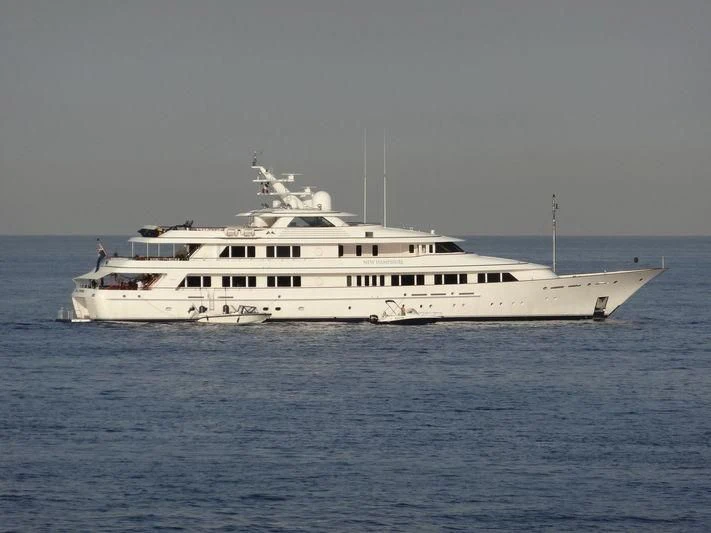a white boat in the water aboard PREDICTION Yacht for Sale