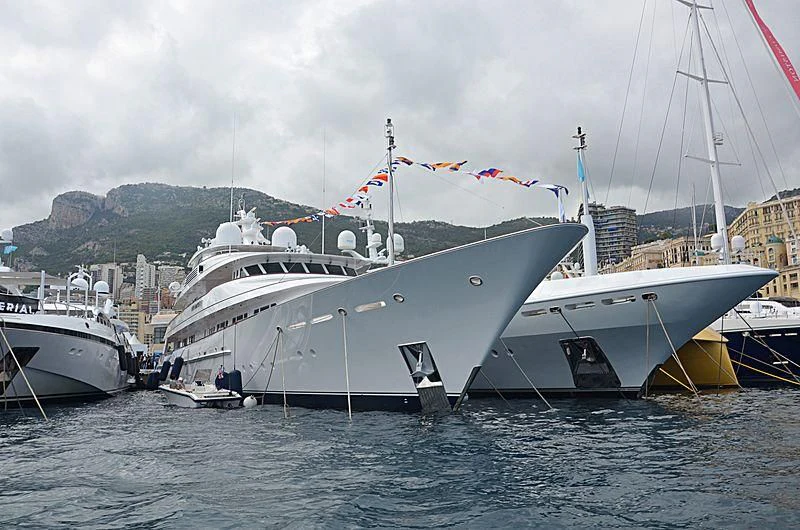 a group of boats are parked in the water aboard PREDICTION Yacht for Sale