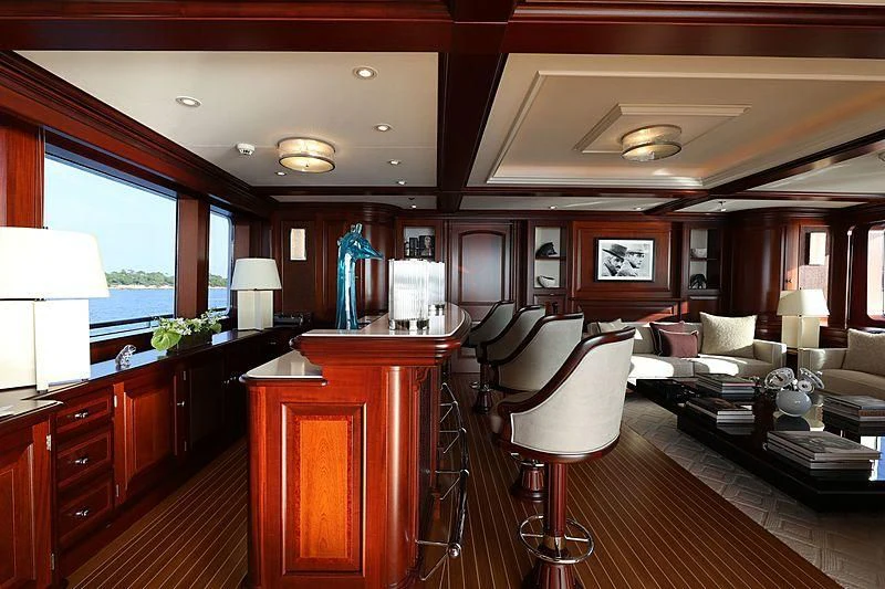 a well lit living room aboard PREDICTION Yacht for Sale