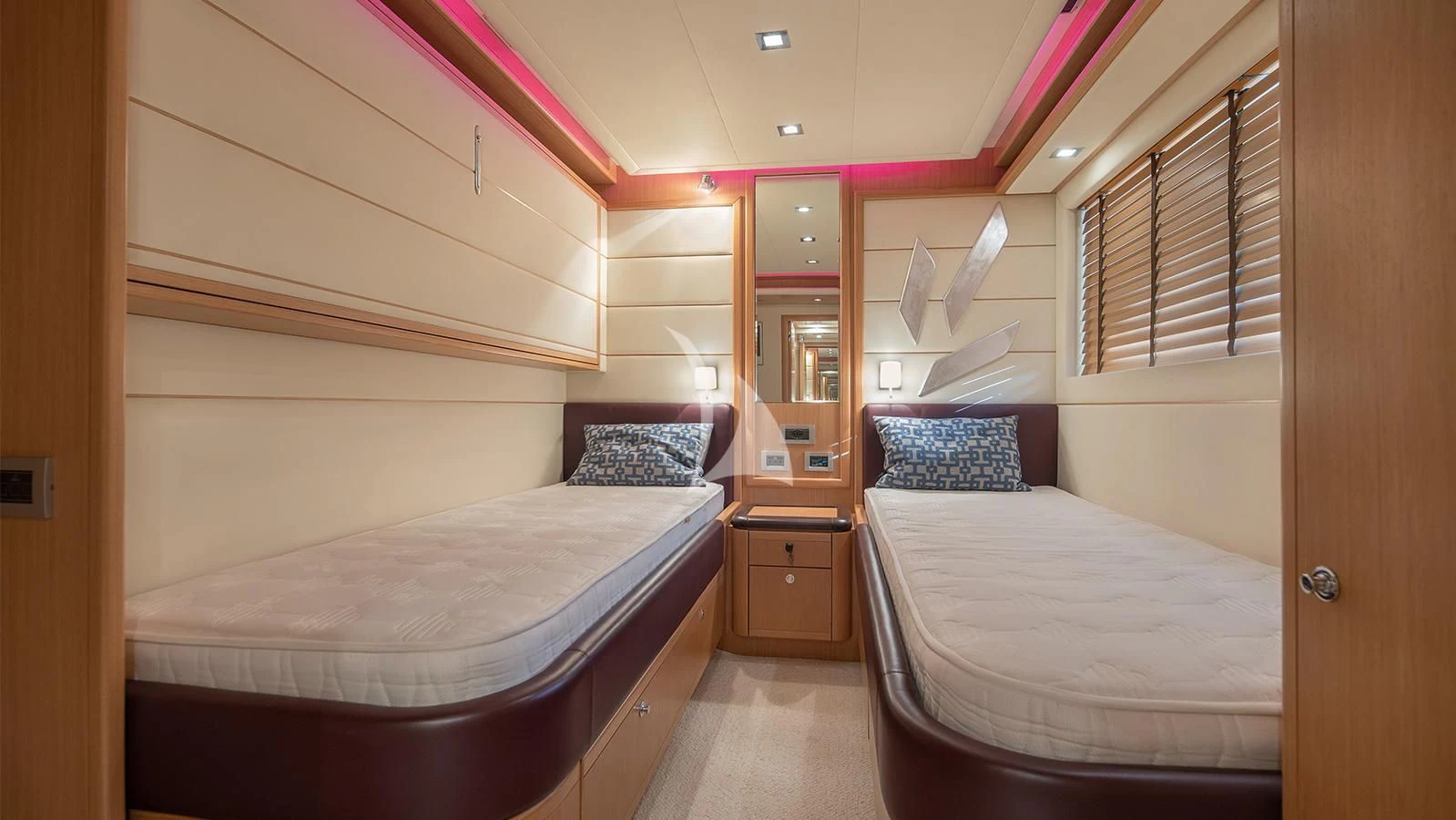 a room with two beds aboard MELI Yacht for Charter