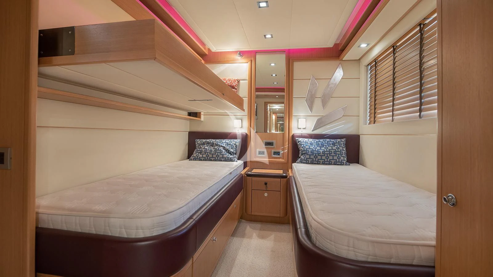 a room with two beds aboard MELI Yacht for Charter
