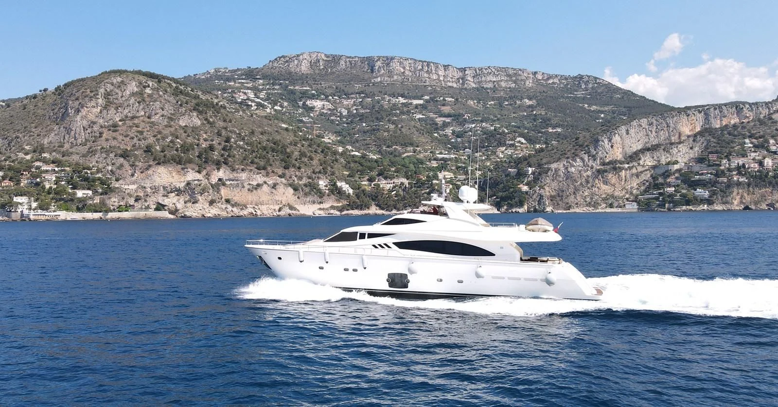 a white yacht on the water aboard MELI Yacht for Charter