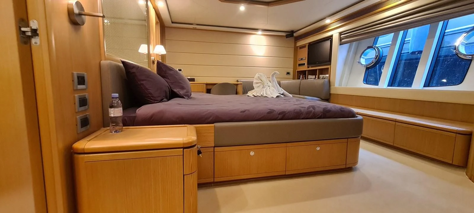 a bed in a room aboard MELI Yacht for Charter
