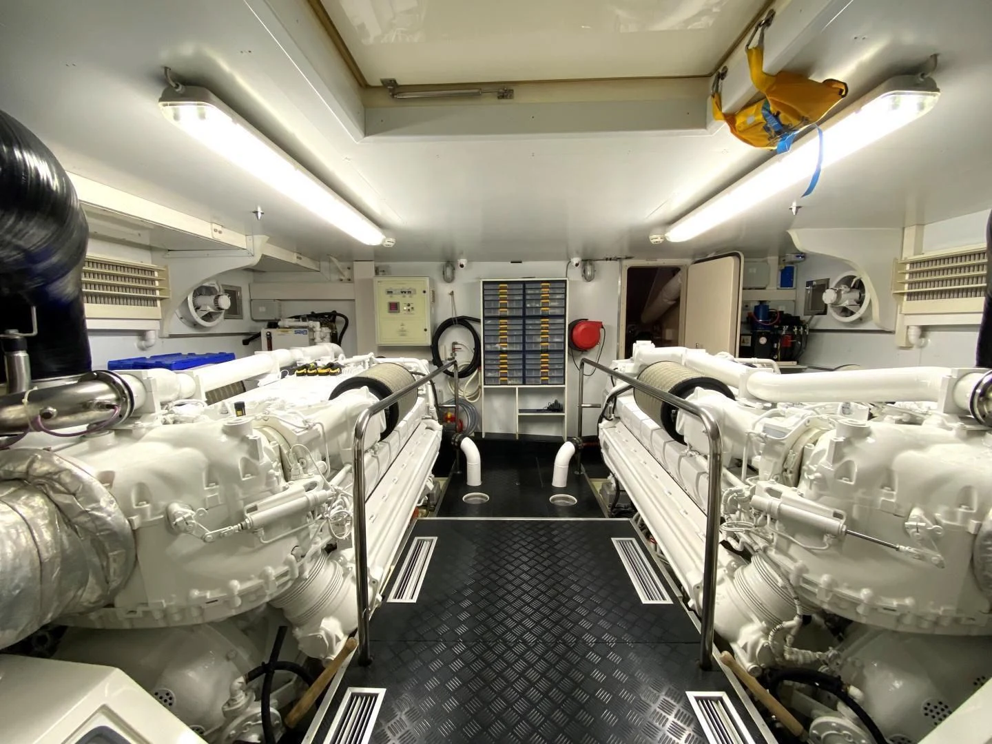 a room with a large machine aboard MELI Yacht for Charter