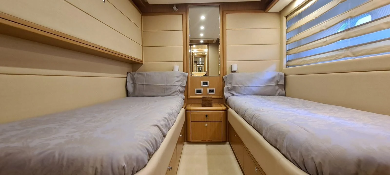a room with two beds aboard MELI Yacht for Charter