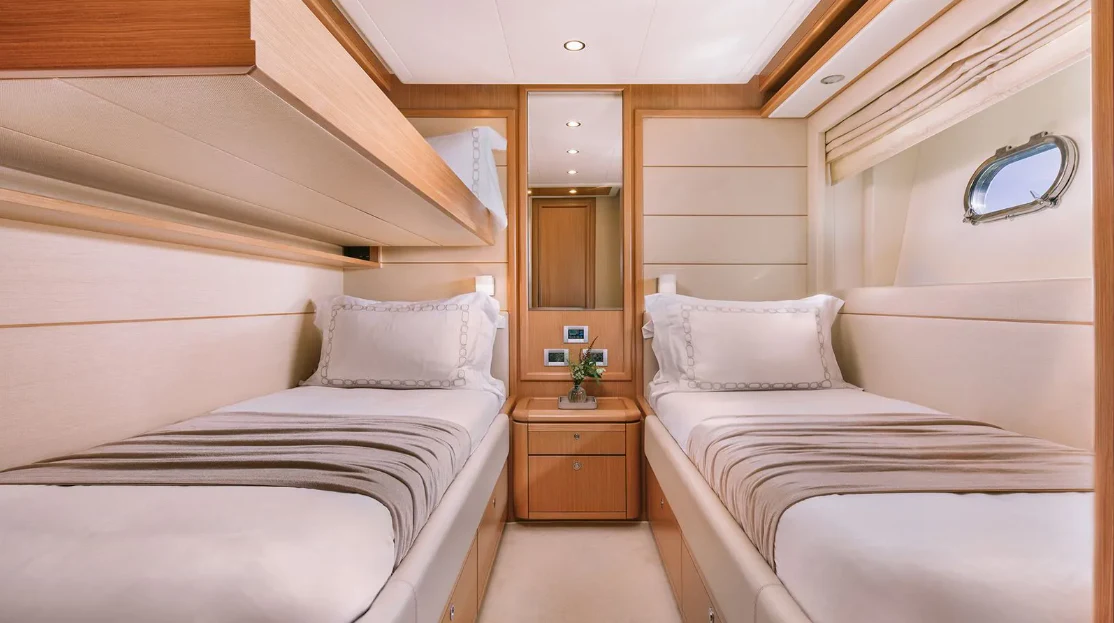 a room with two beds aboard MELI Yacht for Charter