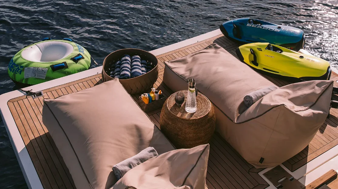 a boat with a bucket and a bucket on it aboard MELI Yacht for Charter