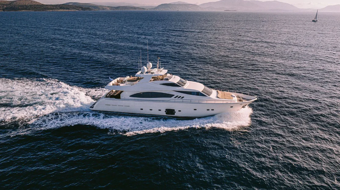 a white yacht on the water aboard MELI Yacht for Charter