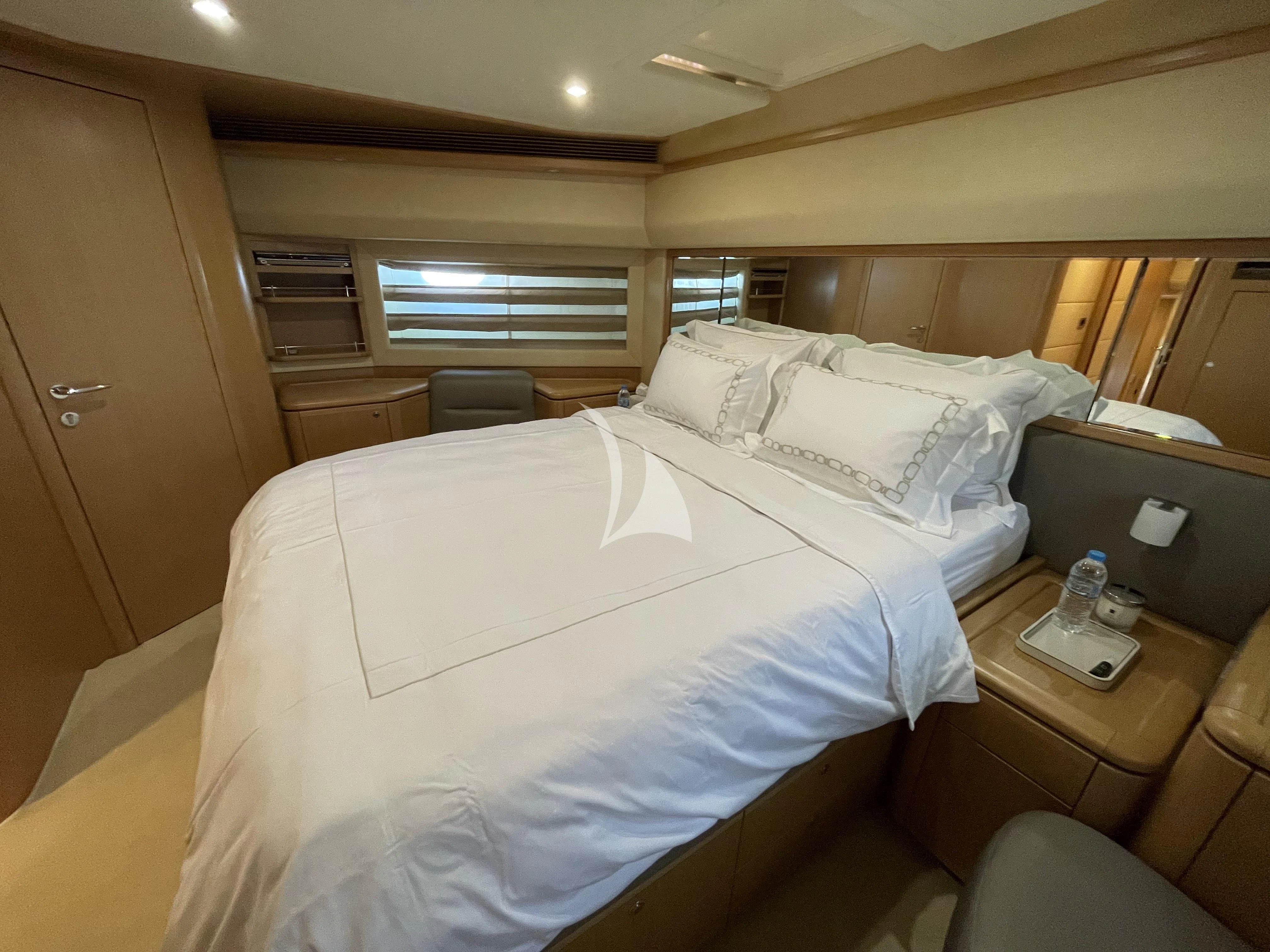 a room with two beds aboard MELI Yacht for Charter