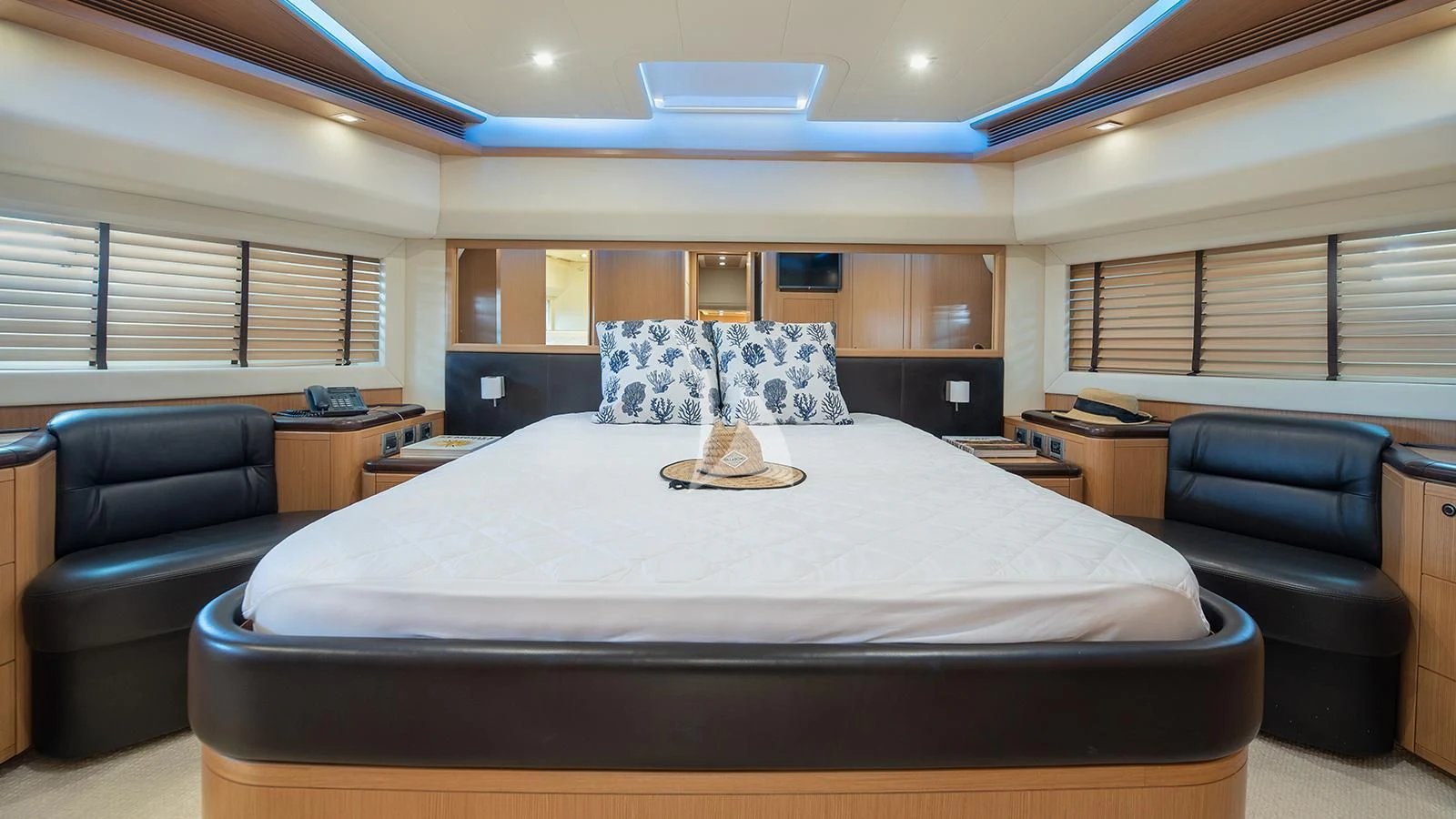 a bed in a room aboard MELI Yacht for Charter