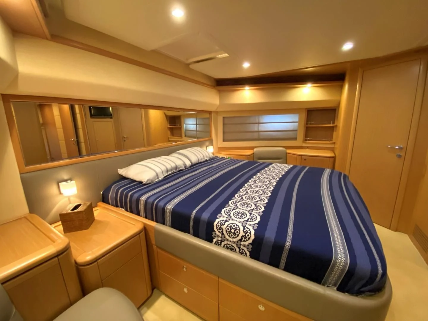 a bed in a room aboard MELI Yacht for Charter