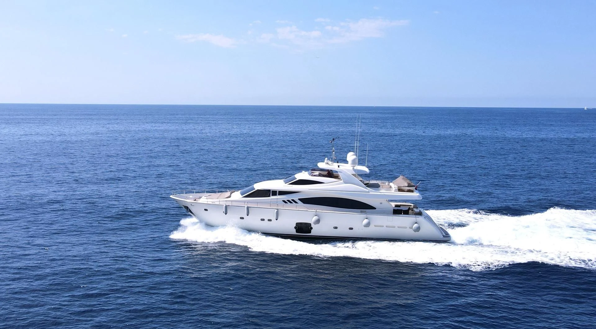 a white yacht in the water aboard MELI Yacht for Charter