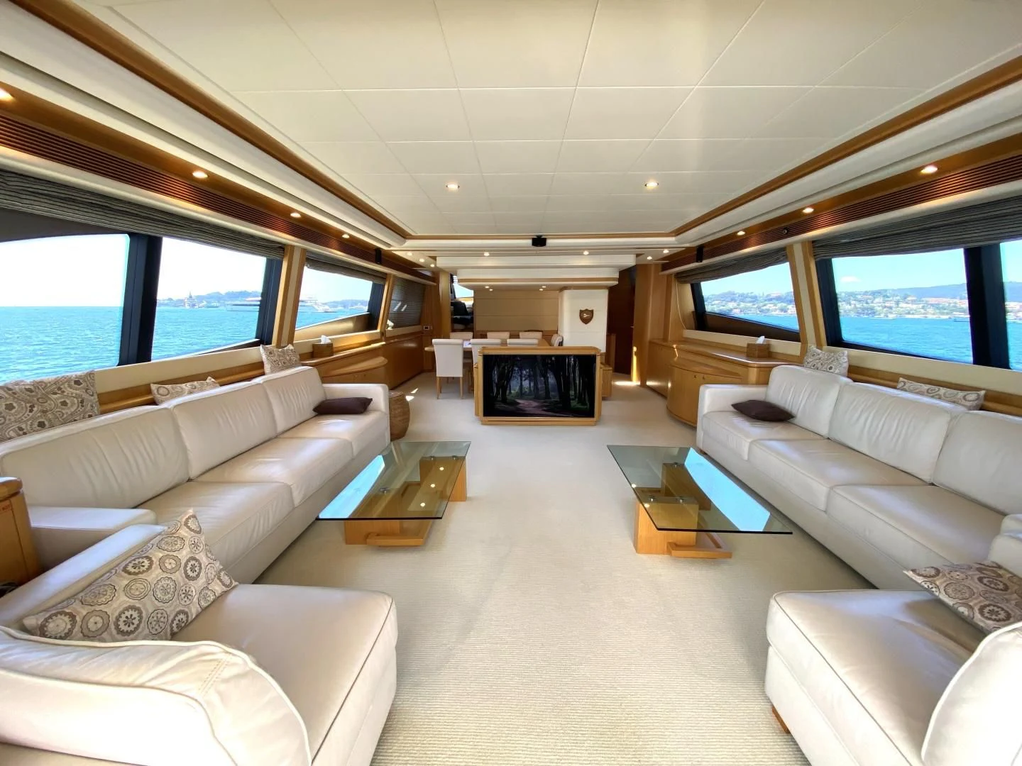 a room with a couch and a tv aboard MELI Yacht for Charter