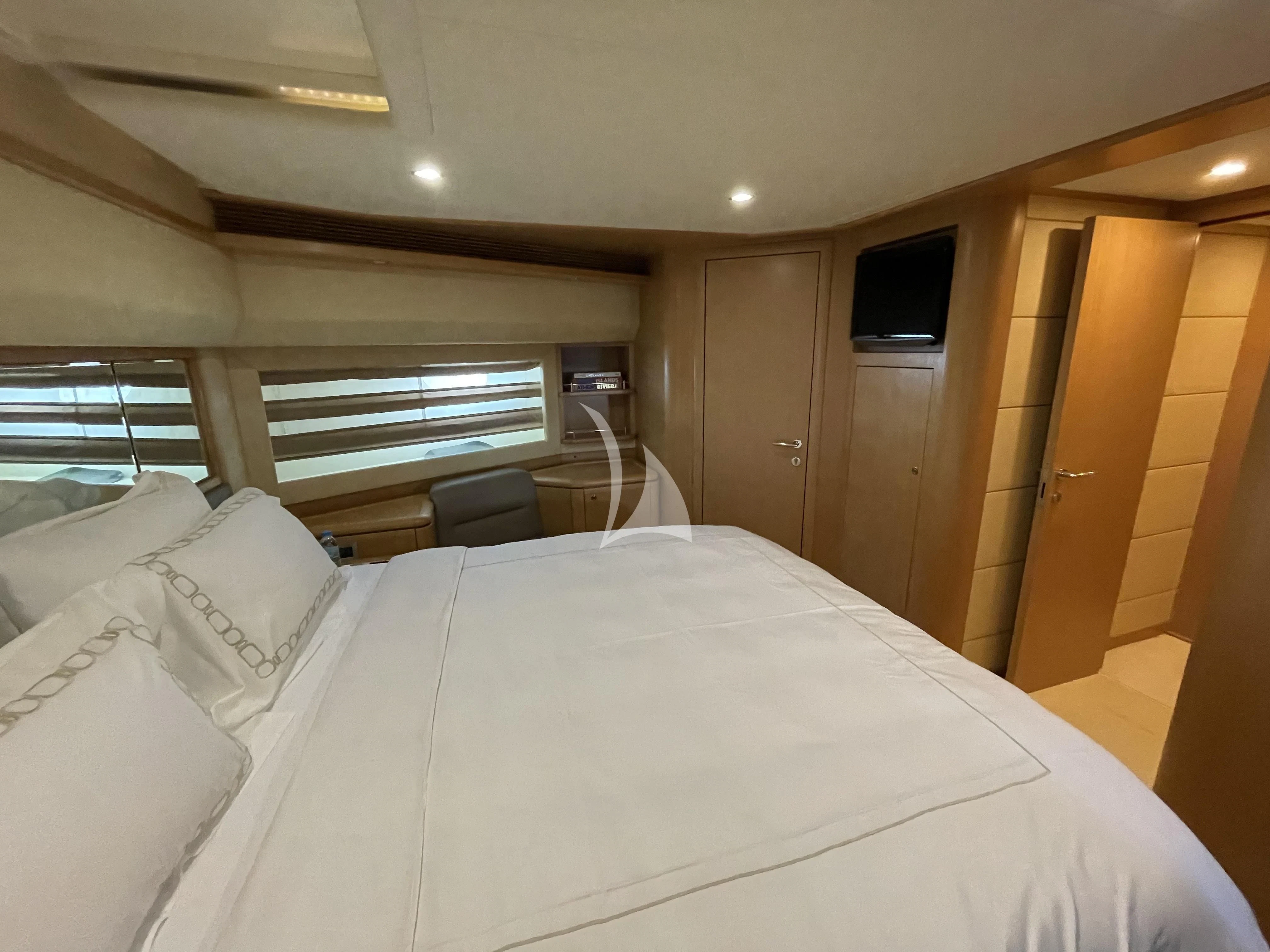 a bed in a room aboard MELI Yacht for Charter
