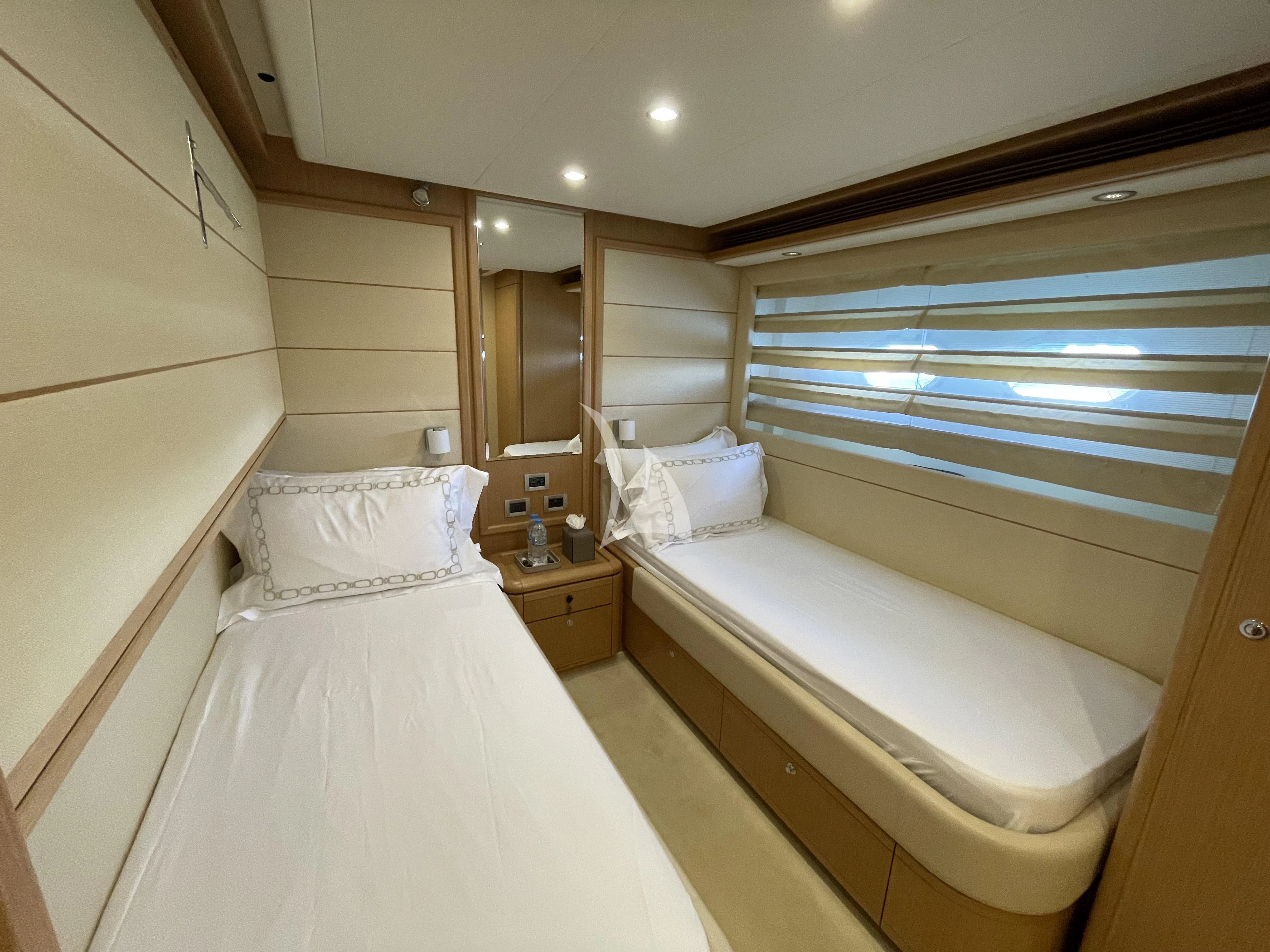 a couple of beds in a room aboard MELI Yacht for Charter
