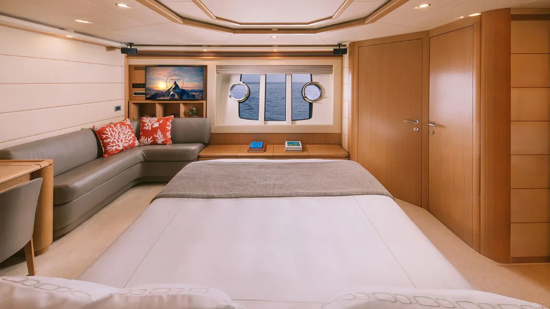 a bed in a room aboard MELI Yacht for Charter