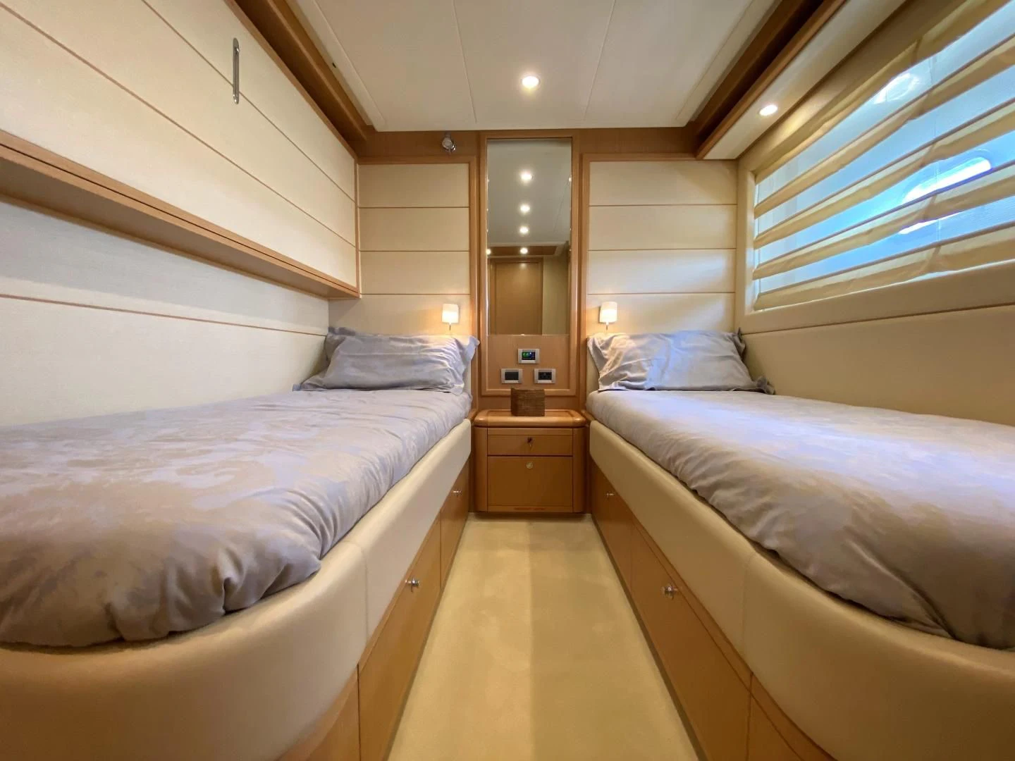 a room with two beds aboard MELI Yacht for Charter
