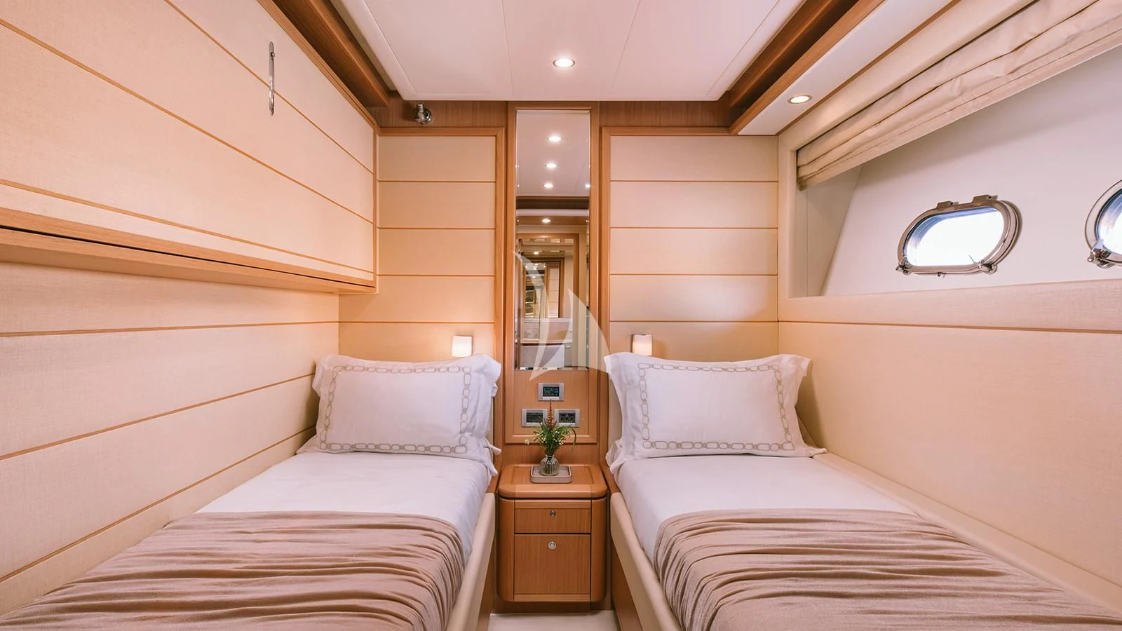 a room with two beds aboard MELI Yacht for Charter