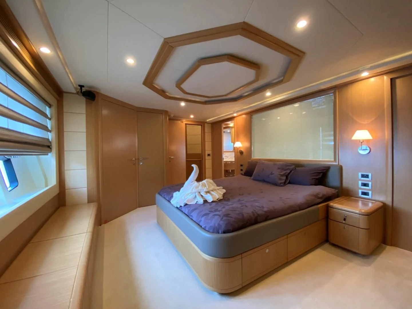 a bed in a hotel room aboard MELI Yacht for Charter